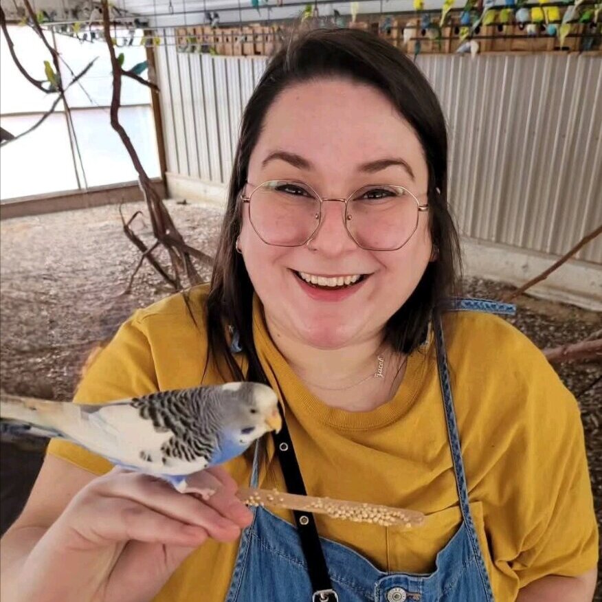 Jordan with a parakeet